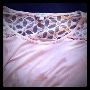 Short sleeve pink top.